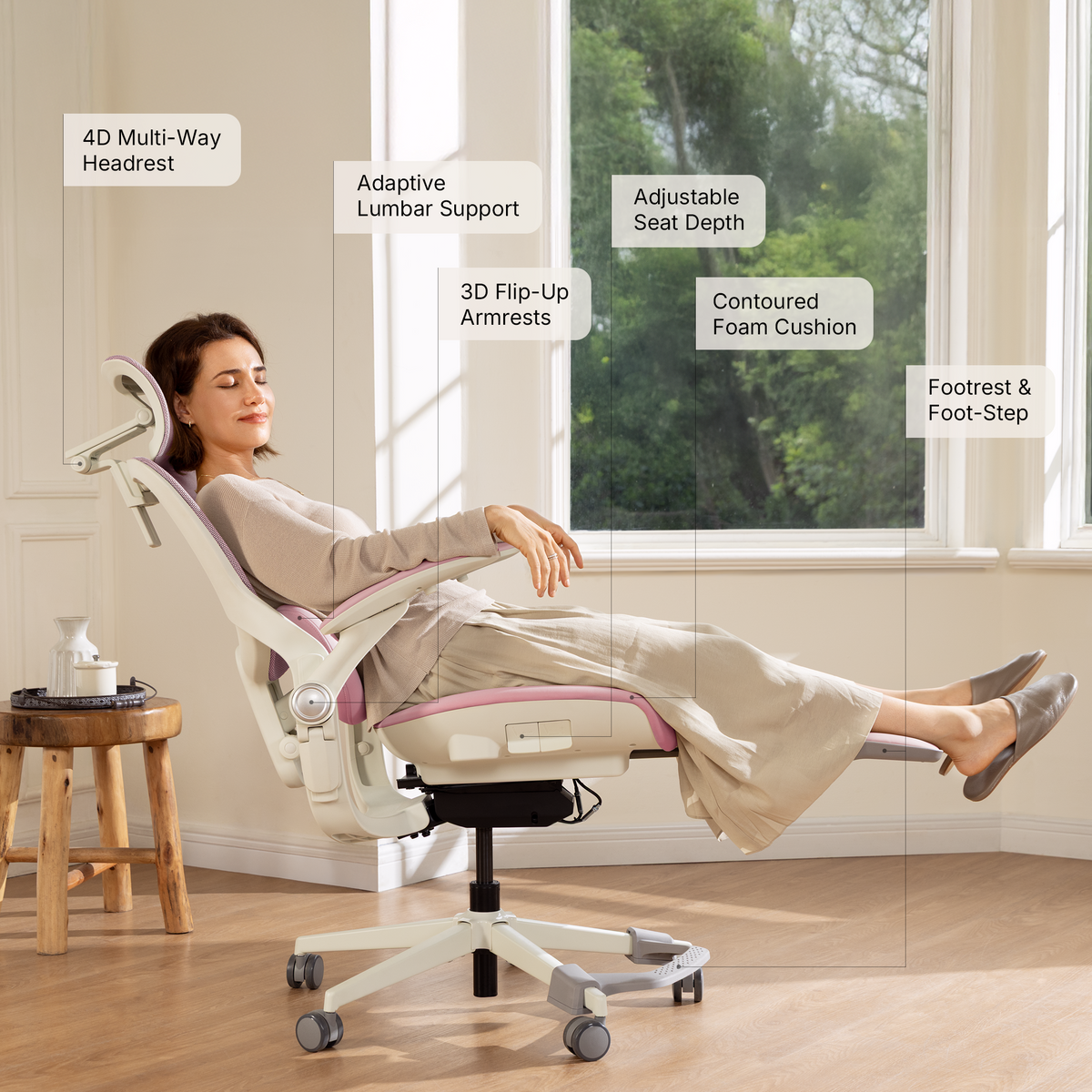 Woman reclining in the CabeVibe S2 ergonomic office chair with adjustable headrest, lumbar support, seat depth, armrests and footrest
