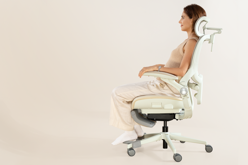 A profile view of the CabeVibe S2 ergonomic chair, illustrating its fit for a seated user with proper spinal support, showcasing the transition from specific targeting to universal ergonomic comfort for all body types.