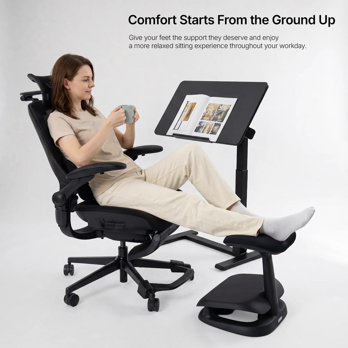Cream Adjustable Under-Desk Footrest angled view showing contoured footrest and rocking base 